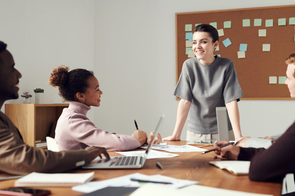 A woman speaking during a meeting.